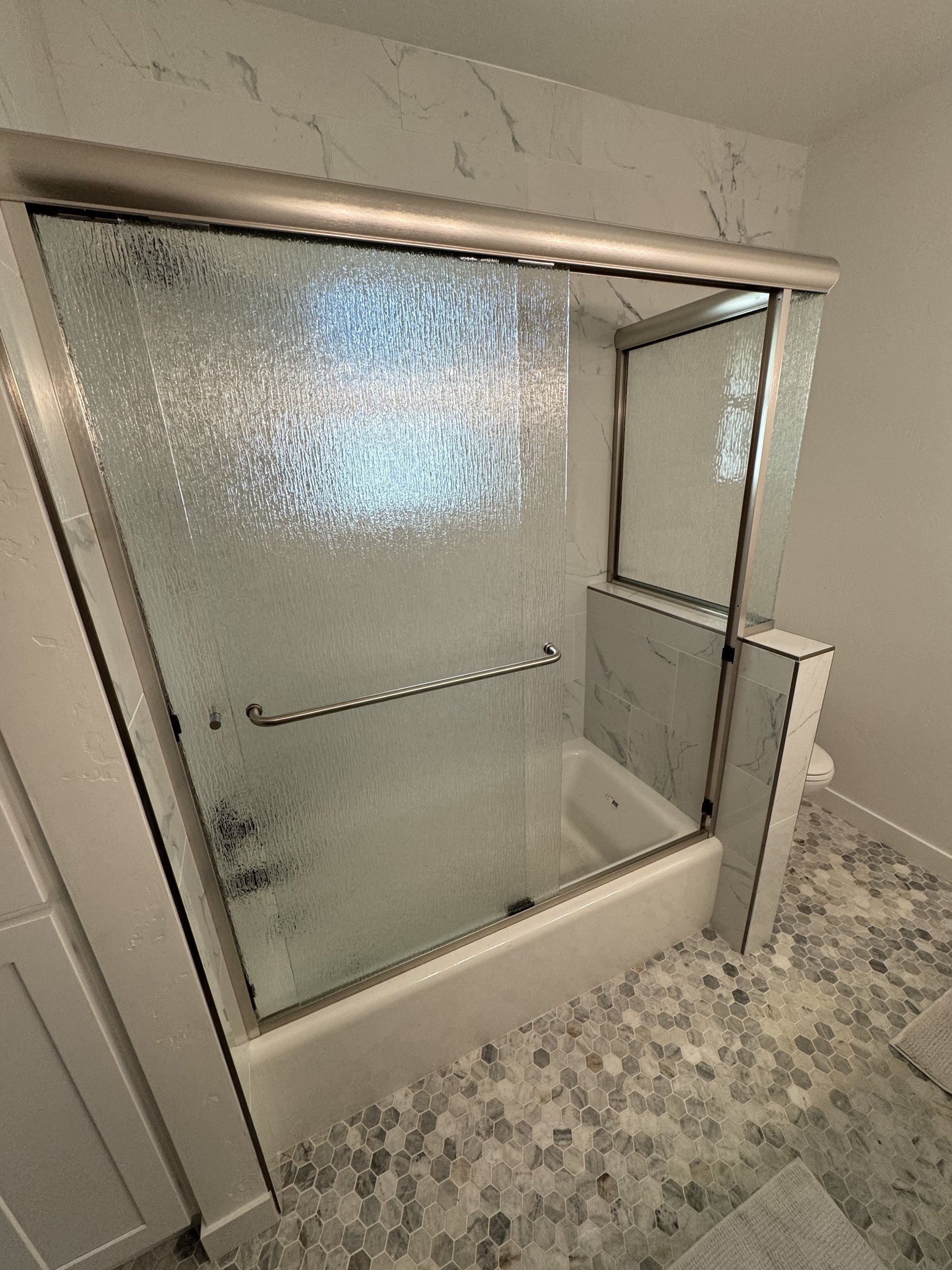 Custom frameless shower door